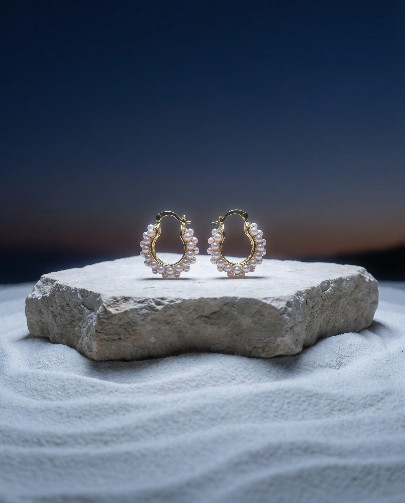 Hoop earrings with a cluster of pearls