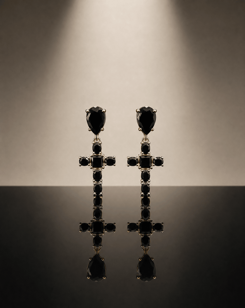 Black cross earrings worn – Phoebe's