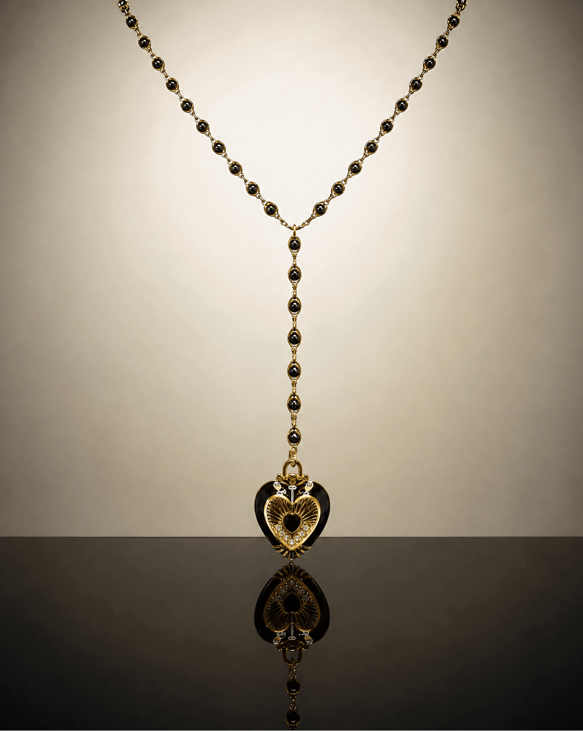 Black and gold Sacred Heart lariat necklace – Phoebe's