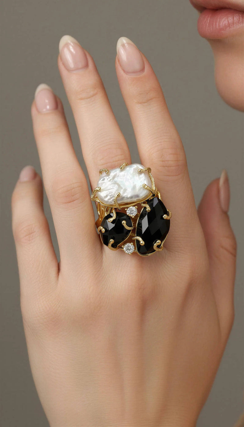 Black Agate and Mother-of-Pearl Ring · Strength and Timeless Elegance