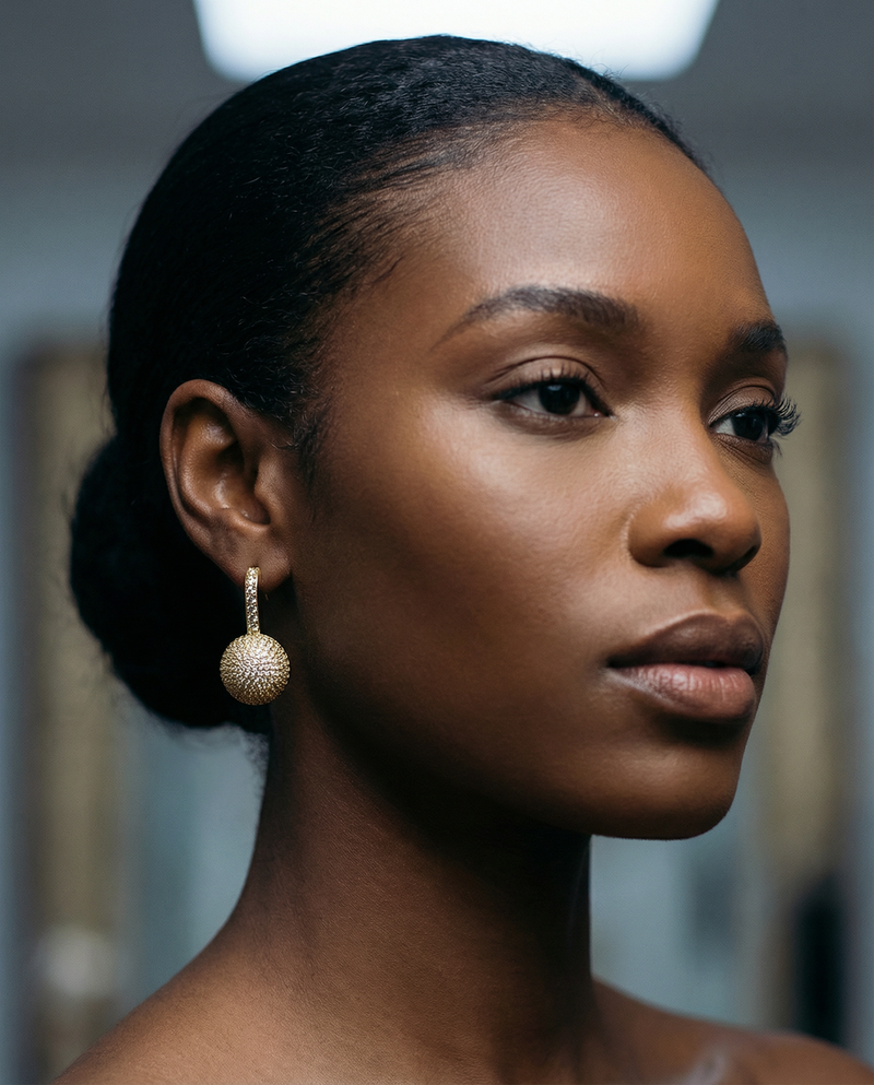 Gold Earrings with textured sphere