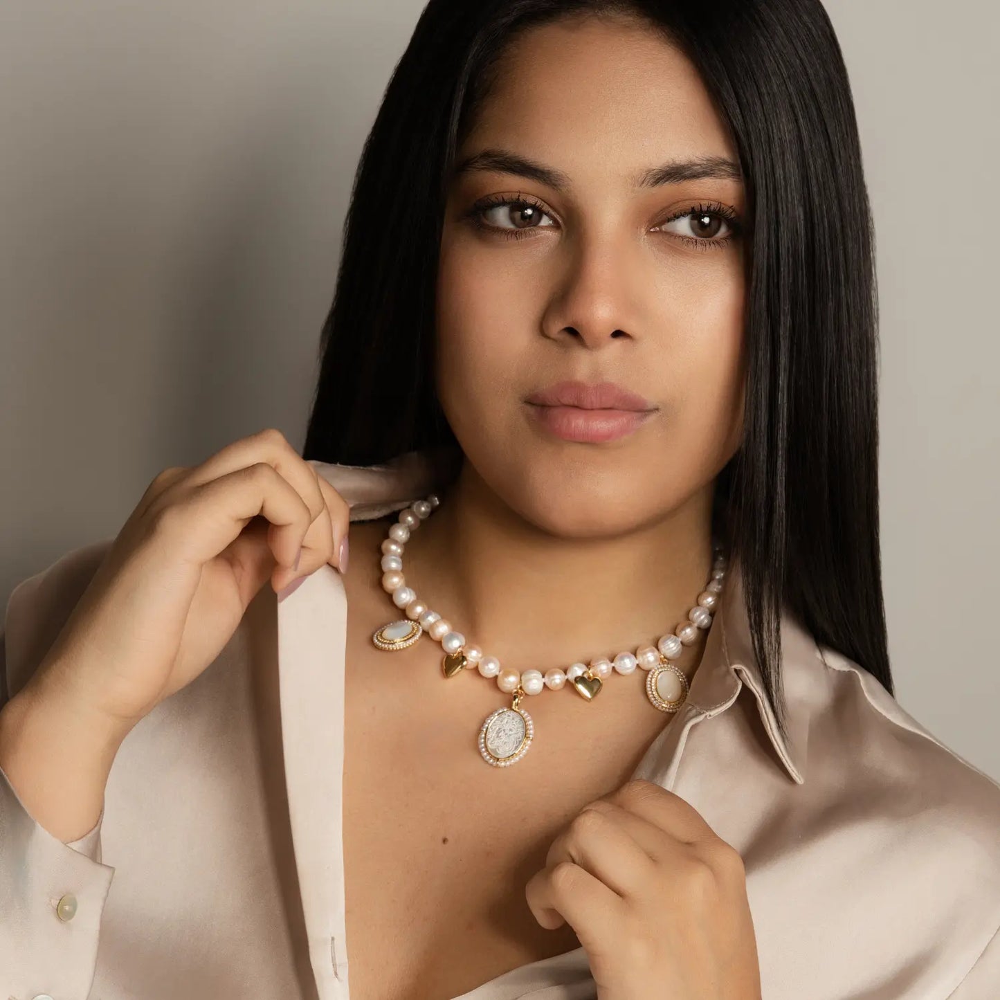 Pearl Necklace with Mother of Pearl and Virgin Charms