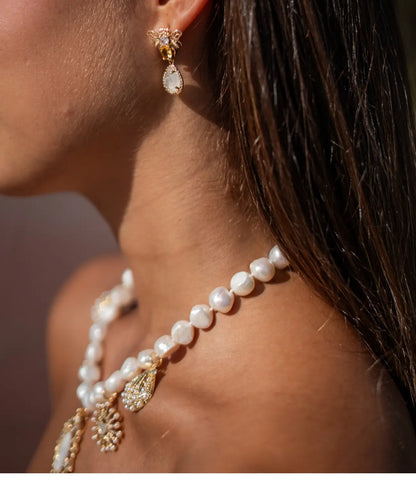 Pearl Necklace with a Virgin Mary Medal and Mother-of-Pearl Charms PHOEBE'S 