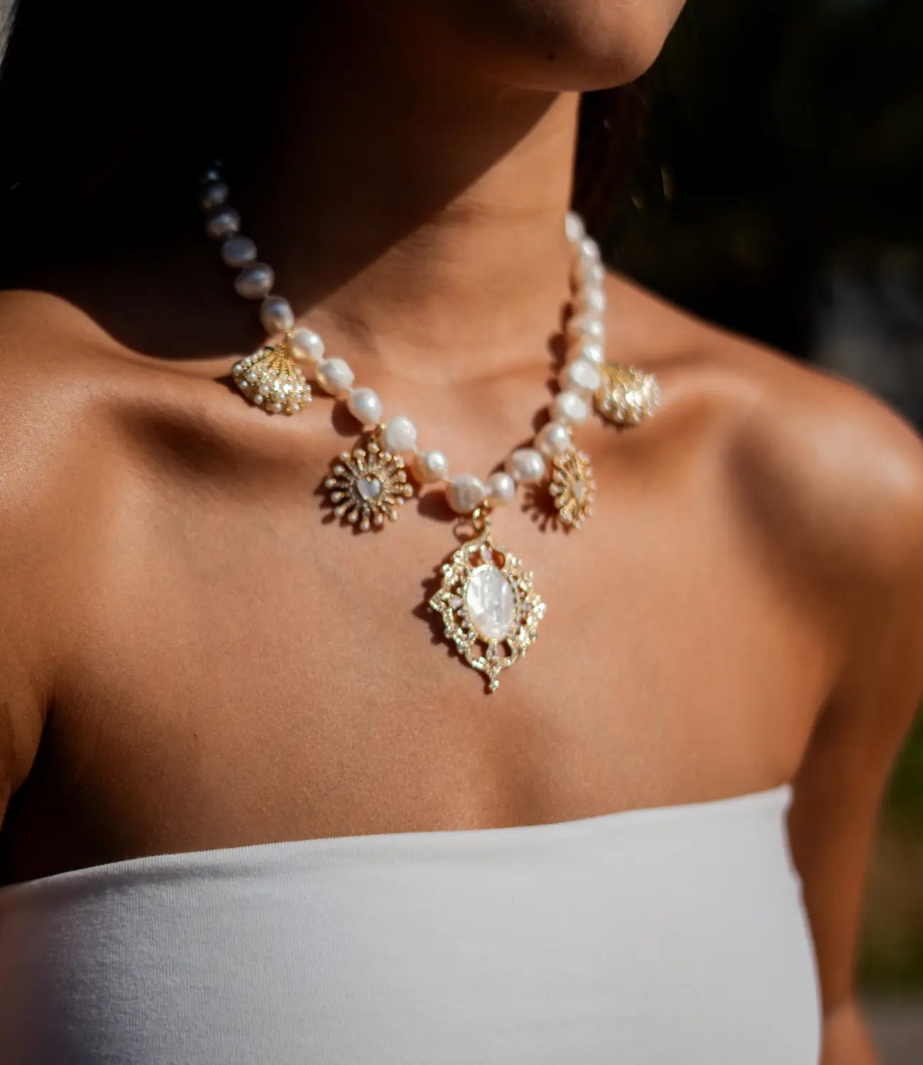 Pearl Necklace with a Virgin Mary Medal and Mother-of-Pearl Charms PHOEBE'S 