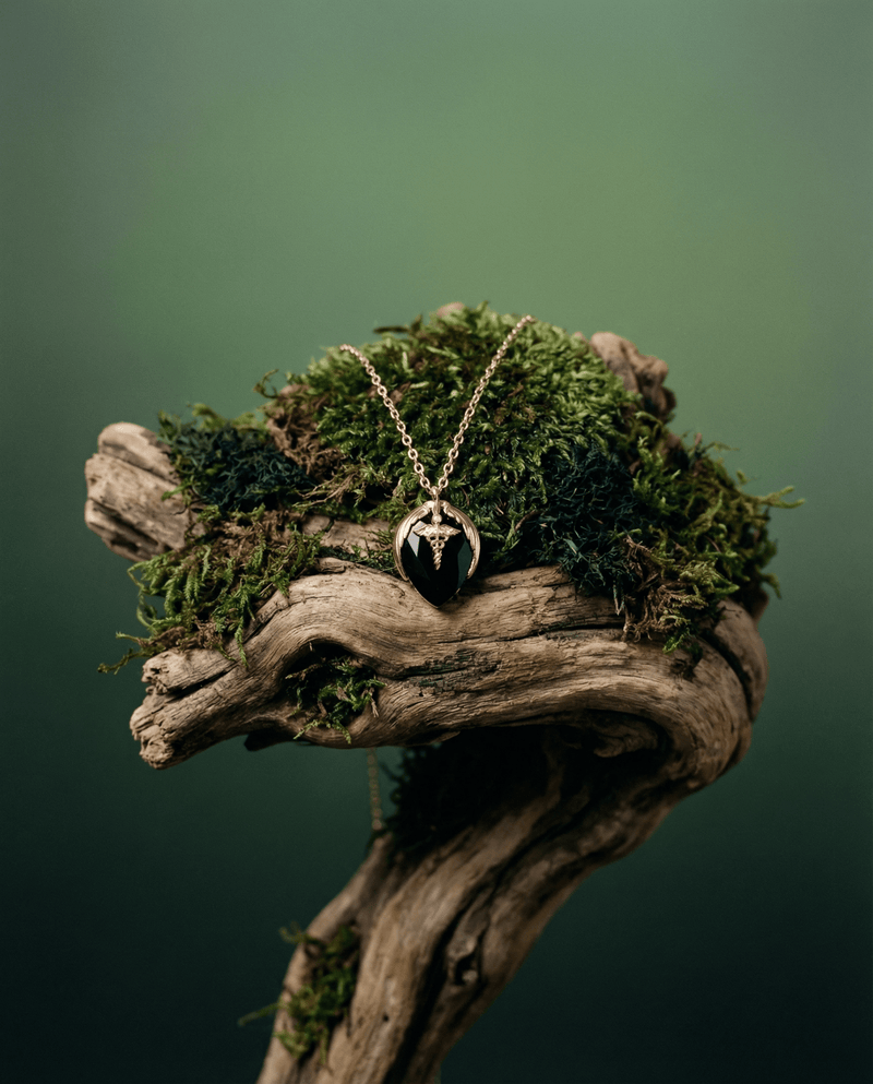 Caduceus medical symbol pendant detail – Phoebe's