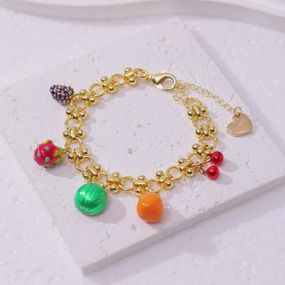 Pulsera con dijes de frutas bañada en oro de 18 quilates 